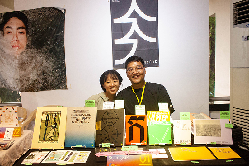 Representatives from Sojanggak, a publisher from South Korea specializing in ASEAN books, are all smiles during the two-day Cebu Art Book Fair last September 9 and 10, 2023.(Photo by Amlorr, 2023)
